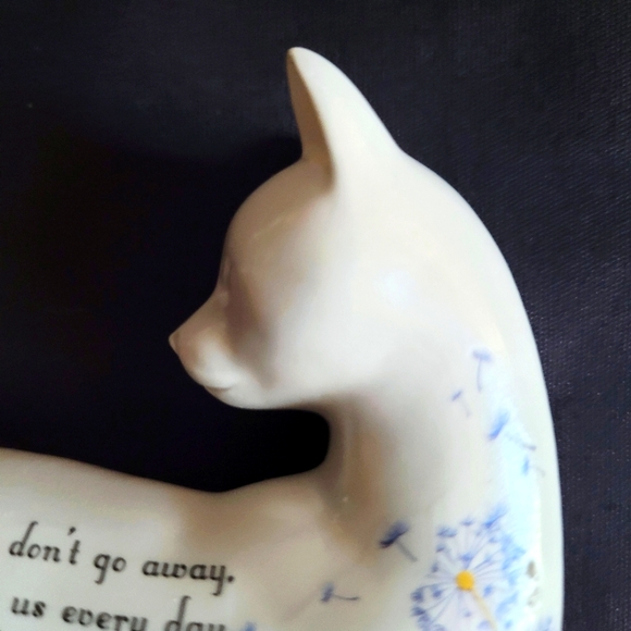 White Cat Looking Back at a Red Bird That Had Landed on His Back - Picture 5 of 12